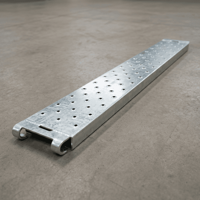 Single perforated galvanized steel scaffold plank on a warehouse floor